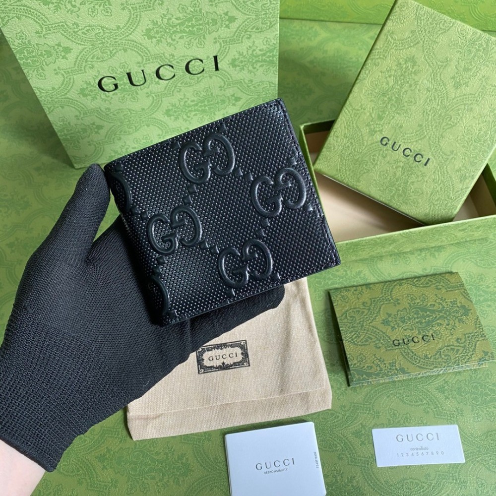 Gucci Bi-fold Wallet In Black GG Embossed Leather