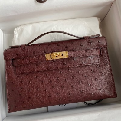 Hermes Kelly Pochette Handmade Bag In Bordeaux Ostrich Leather